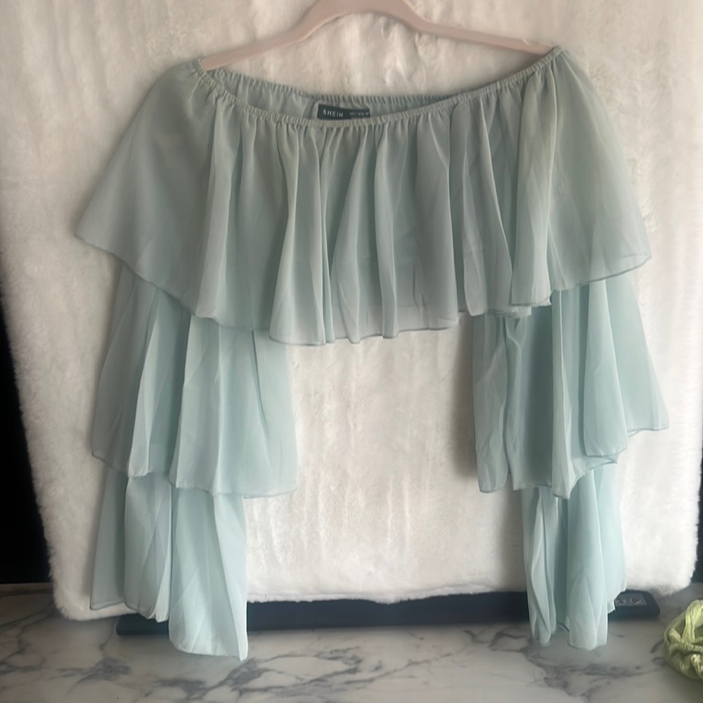 Light green off the shoulder. Crap bell sleeves absolutely so adorable.